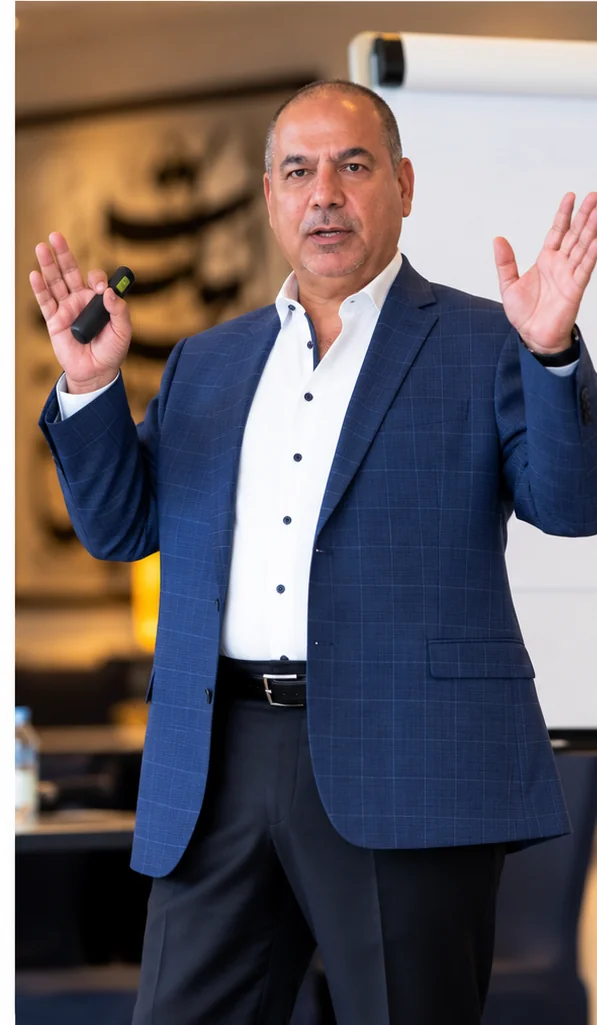 Luay Khoury speaking during a training session